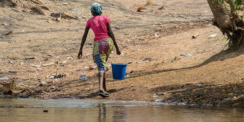 an-african-woman-struggling-with-the-lack-of-clean-water-in-africa