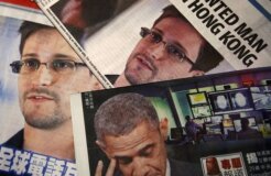 Photos of Snowden, a contractor at the NSA, and U.S. President Obama are printed on the front pages of local English and Chinese newspapers in Hong Kong in this illustration photo