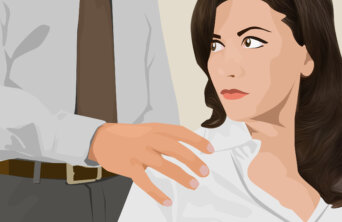 Man touching shoulder of uncomfortable woman co-worker Man touching shoulder of uncomfortable woman co-worker