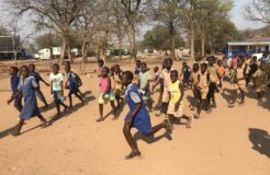 chirundu school project children running crowd