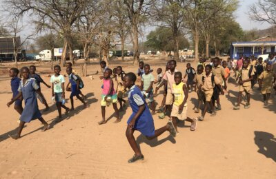 chirundu school project children running crowd