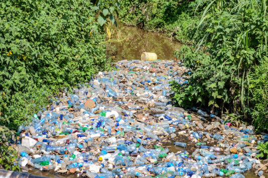 A Section of Njoro River in Nakuru polluted with plastic bottles.