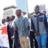 Tatenda Mombeyarara (with clutches) join a protest march against the abduction of Dr Peter Magombeyi in Harare