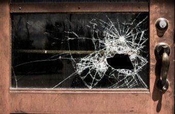 Bullet Hole in school door Bullet Hole in school door