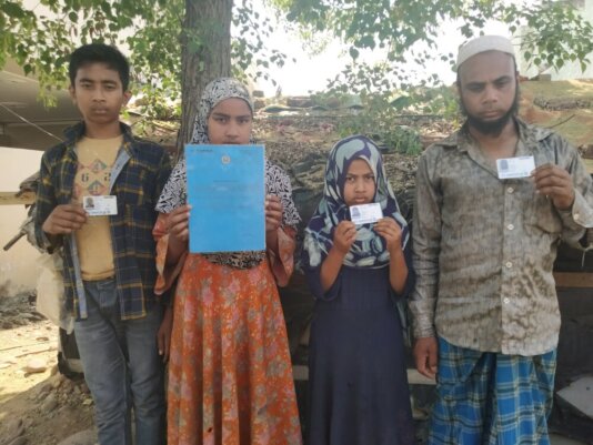 Children and husband, on right, of Hasina Begum, photo, Aakash Hassan
