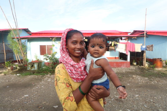 Nepal_Bina and son Yogesh infront of their new house at Hilti site, Birtamod, Jhapa district (PC Abisek Bista)