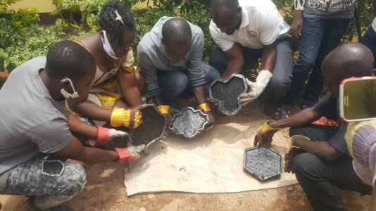 Sample of pavement tiles made from crushing and melting plastics. Photo credit_ Tata Elvis