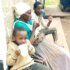 Sarah-Wanjiku2-Gichuhi-having-fortified-porridge-with-her-grandsons-Alex-and-Felix-at-home-in-Nakuru-County,-Kenya---photo-by-Joseph-Maina