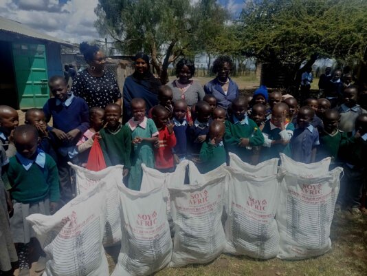 School-children-receive-a-consignent-of-food-in-Laikipia,-Kenya_-credit_-Annie-Munyi