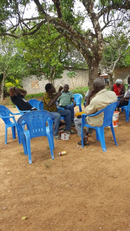 Enow Richard and team resting under a tree after planting trees in Santa, Picture credit, Enow Richard