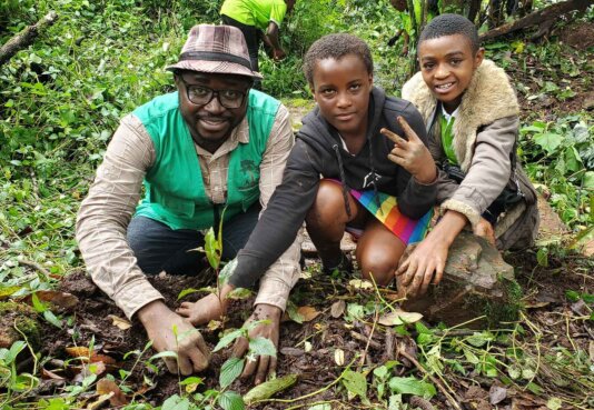 Some-of-the-kids-engaged-with-Ndimuh-Betrand-planting-a-tree-in-Bokova-Buea,-Picture-credit,-VoNat