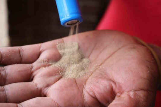 Phillip December showing _battery_ loaded with sand