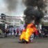 Flames surrounded by students in front of the West Java Provincial Council building, Bandung, 1 September 2025, Leo Galuh.