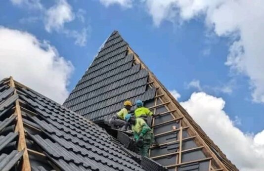 Carpenters installing AMABO Roofing Tiles