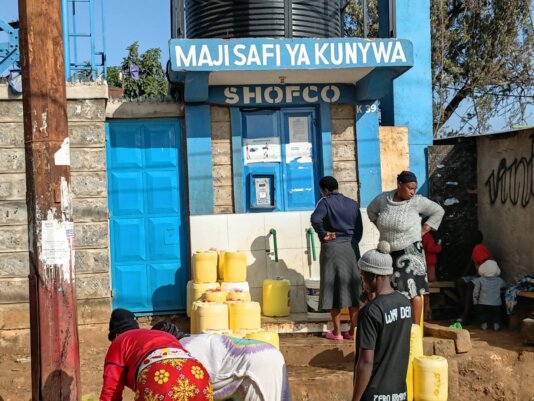 Kibra residents queing up for water at a SHOFCO kiosk - photo by Joseph Maina (1)