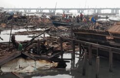 Structures in Makoko reduced to floating debris in a Lagos lagoon