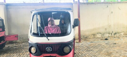 Zainab Abubakar inside her tricycle