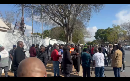 Nigerians gathered at the Nigeria High Commission in South Africa preparing to leave for Lagos