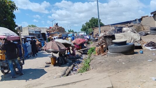 A lorry fills with cartons of fish prepares for a long trip out of Maiduguri.