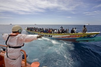 A traditional fishing boat laden with migrants off Tenerife