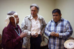 Lawyer Pierre Servan-Schreiber met two katsina priests when a katsina was returned to the Hopi in July 2013. © Survival