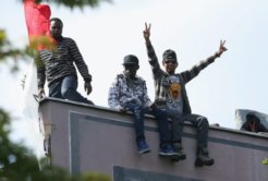 refugee-rooftop-1-7-14 refugee-rooftop-1-7-14