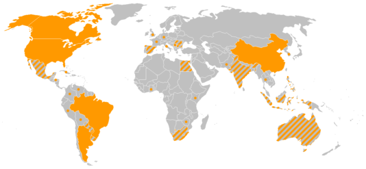 2005 world production map of GMOs. Solid orange represents countries that produce more than 95% of GMO products. Orange and gray stripes represent countries that produce commercialized GMO products. Orange dots represent countries participating in experimental GM crops. 2005 world production map of GMOs. Solid orange represents countries that produce more than 95% of GMO products. Orange and gray stripes represent countries that produce commercialized GMO products. Orange dots represent countries participating in experimental GM crops.