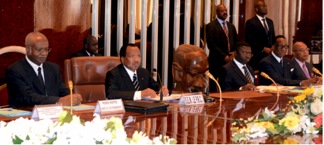 President Paul Biya in the middle and his council of ministers making top decisions about how to manage the crisis.