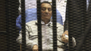 Egypt's ousted President Mubarak sits inside a dock at the police academy on the outskirts of Cairo Egypt's ousted President Mubarak sits inside a dock at the police academy on the outskirts of Cairo