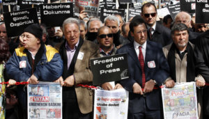 Journalists and activists participate in a rally calling for press freedom in central Ankara