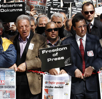 Journalists and activists participate in a rally calling for press freedom in central Ankara