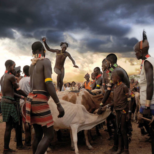Hamer, Omo Valley, Ethiopia.
In the Omo Valley, Ethiopia, Hamer men take part in a cattle-leaping ceremony. Hamer, Omo Valley, Ethiopia.
In the Omo Valley, Ethiopia, Hamer men take part in a cattle-leaping ceremony.