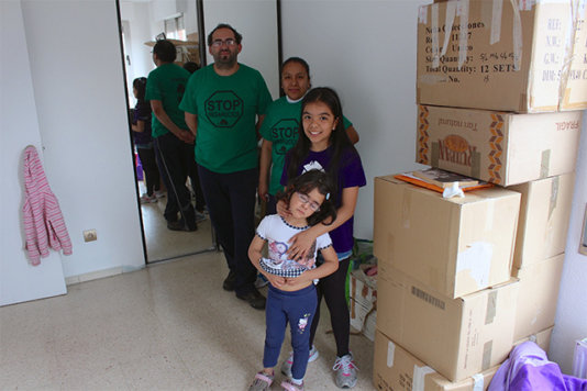 Lorena’s family in their new apartment.