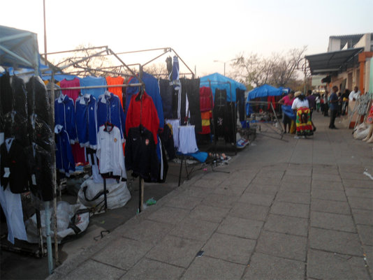 Vendors selling along Third Avenue in Bulawayo/Zimbabwe Vendors selling along Third Avenue in Bulawayo/Zimbabwe