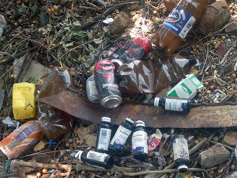 Discarded containers of Broncleer, Dragon energy drink , Chibuku<br /> Sorghum beer and Cigarettes in a backyard in Bulawayo Discarded containers of Broncleer, Dragon energy drink , Chibuku<br /> Sorghum beer and Cigarettes in a backyard in Bulawayo