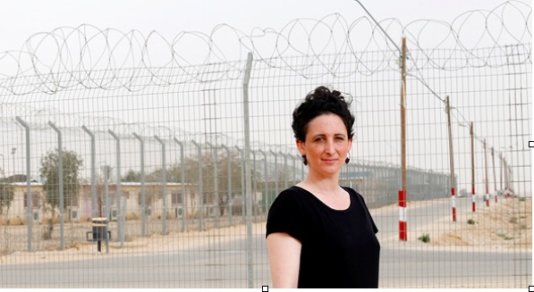 Ravid, this week at the \'Holot\' detention facility. \'Germany scattered a million refugees in a way that matches their skills and available jobs in various communities.\' Ravid, this week at the \'Holot\' detention facility. \'Germany scattered a million refugees in a way that matches their skills and available jobs in various communities.\'