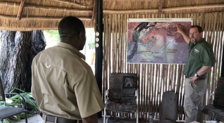 Carl van der Riet explains to Zimbabwe National Park Authority members the transformation plans for Zambesi Valley. Photo: Murat Suner