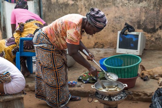 Ama, Gomoa Fetteh – frying fish.<br /> “There isn’t enough fish now. So I get some of my fish from the cold store before I smoke and sell them.” Ama, Gomoa Fetteh – frying fish.<br /> “There isn’t enough fish now. So I get some of my fish from the cold store before I smoke and sell them.”