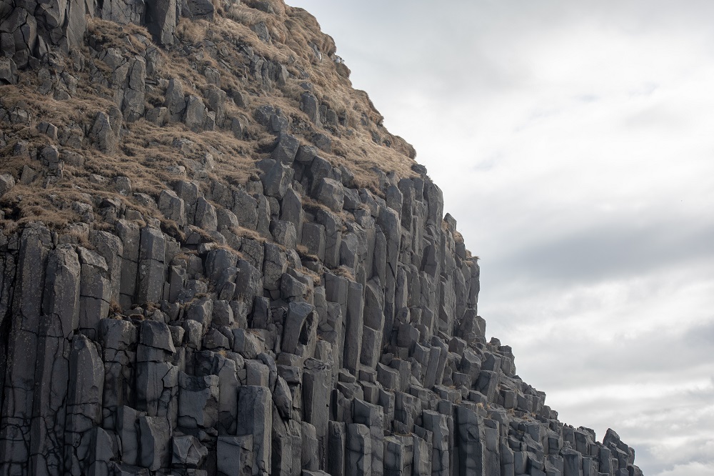 Basalt rock formation on icelandic coast.