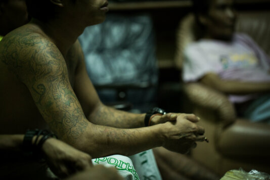 Burmese migrant workers await repatriation at a shelter for victims of human trafficking in Songkhla, southern Thailand. Many thousands of workers are trafficked onto fishing vessels around the world every year, as fish stocks collapse and vessel owners seek to maintain profits by using underpaid or even slave-labour. IMG_1952