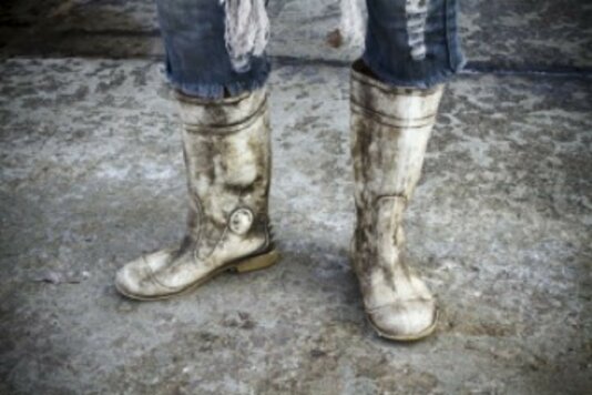 Burmese migrant workers in Thailand are easily identified by their white boots. Tun Myint* was caught by police after escaping from the fishing vessel he had been trafficked onto. Instead of helping him, the officers sold him back to the same company. In March 2017, the company owner was jailed for 14 years for the trafficking of migrant workers onto fishing vessels. White boots1