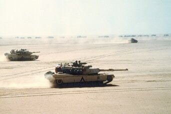1080px-Abrams_in_formation