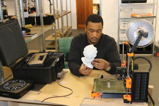 Red Cup Village founder Luvuyo Ndiki in the company’s 3D printing manufacturing unit.