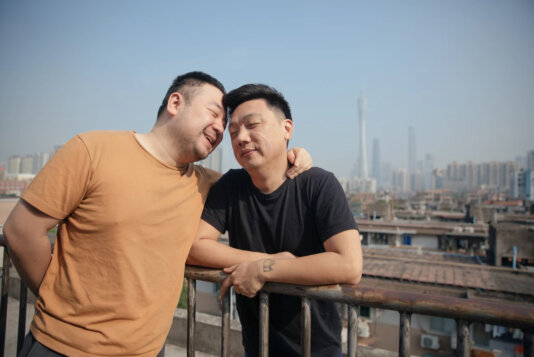 \'Yanzi and I both work on issues concerning the wellness and welfare of the LGBT+ community, so we live and work together\'.\' Yanzi & Yangyi, a gay couple in their 30\'s from Guangdong.