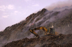A-bull-dozer-at-work-amidst-ravaging-fires-at-the-Bhalswa-landfillsite