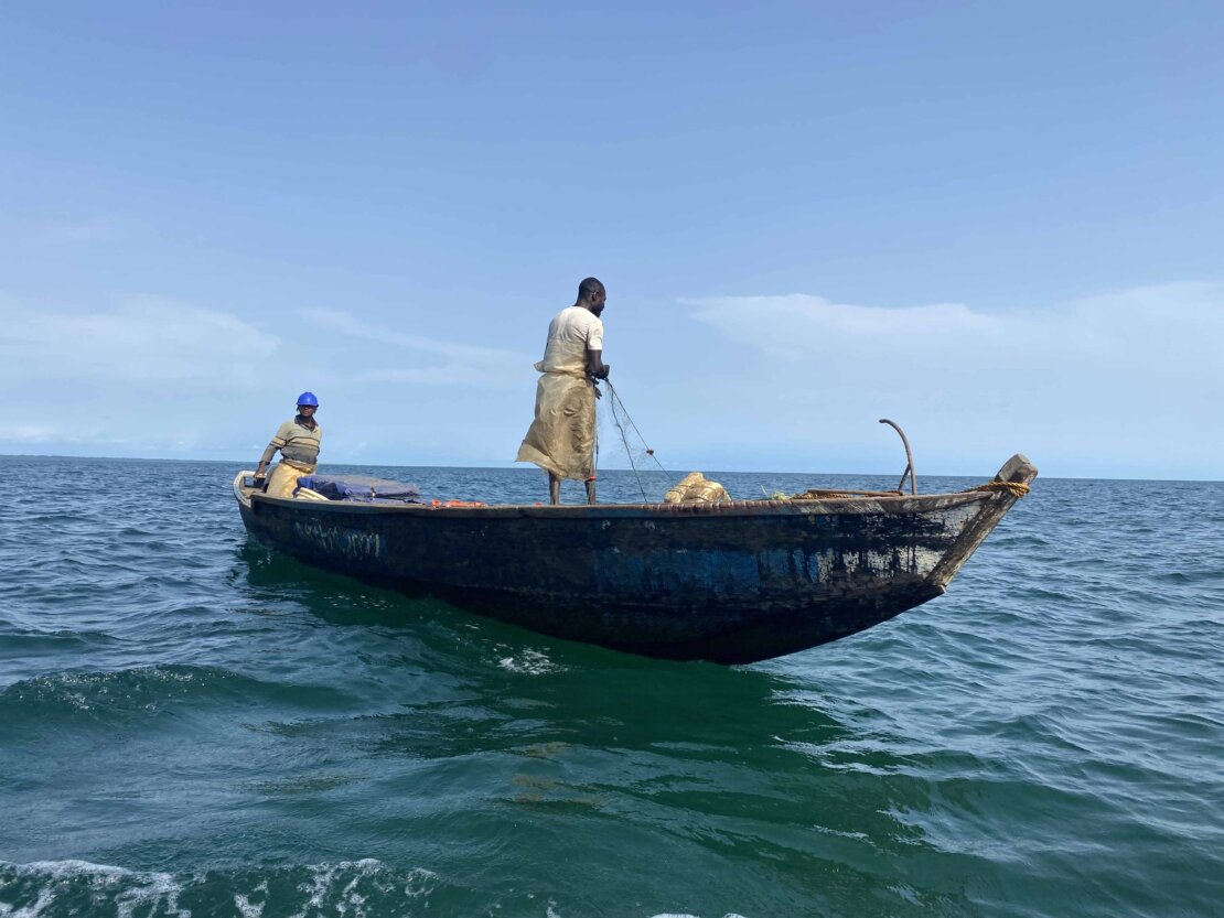 Fishers in the sea carrying out their fishing activities. Copyright EJF, April 2023