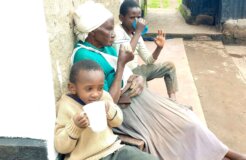Sarah-Wanjiku2-Gichuhi-having-fortified-porridge-with-her-grandsons-Alex-and-Felix-at-home-in-Nakuru-County,-Kenya---photo-by-Joseph-Maina